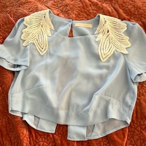 Adorable drop with shoulder embellishments from haute society in a size medium.